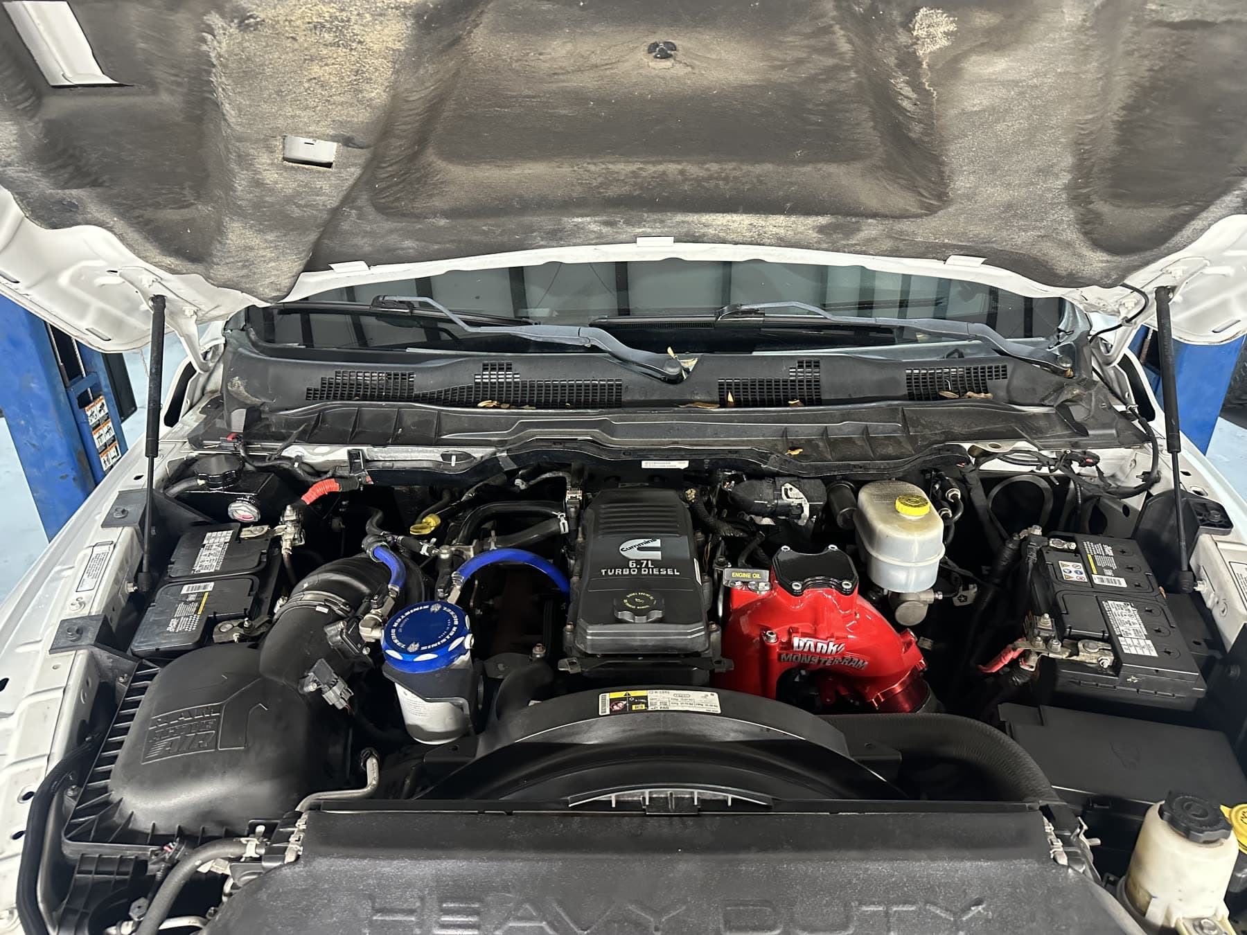 Close-up of a turbocharger mounted in an engine bay