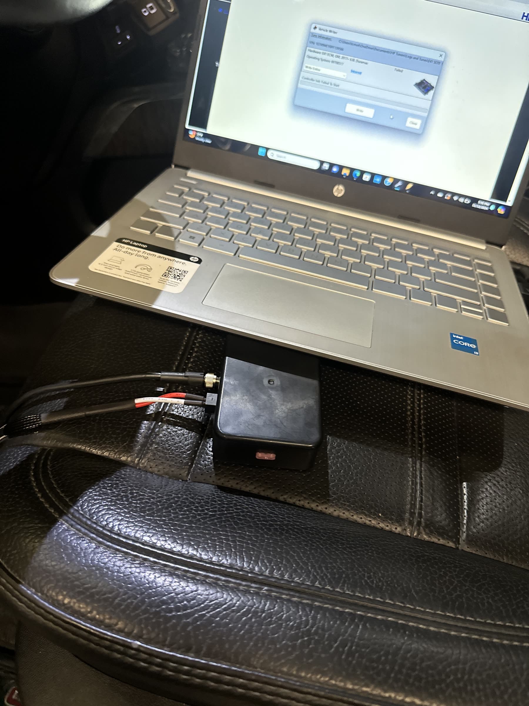 Tuning laptop connected to a truck during a calibration session